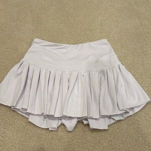 Gold hinge white tennis skirt